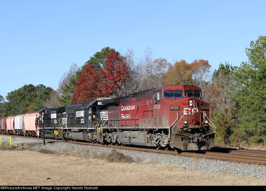 CP 9735 leads NS train 61U eastbound